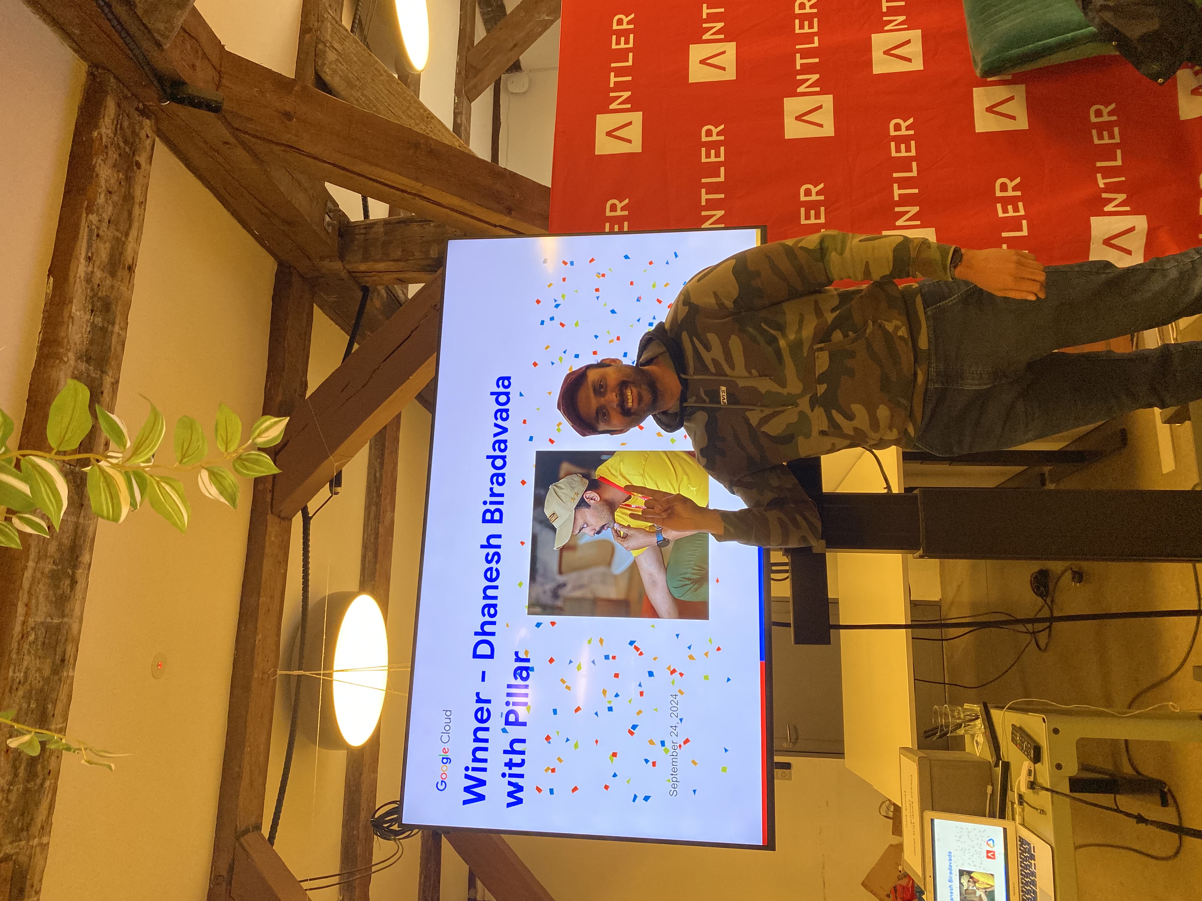 Dhanesh winning the Google x Antler hackathon with PILLAR